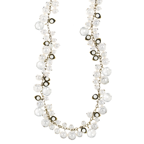 Pearl + Crystal Drops Long Necklace on a white background