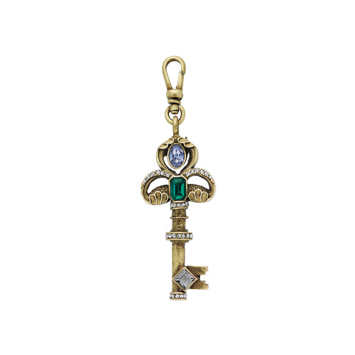 TRESORS DECORATIVE KEY CHARM on a white background