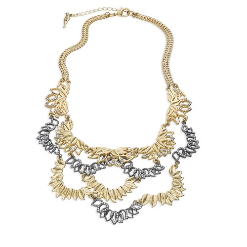 Layered Leaves Statement Bib on a white background